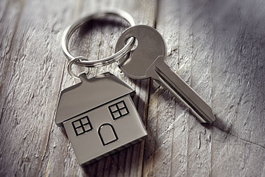 Landlord locksmith services Belfast - house key on keyring representing rental property security
