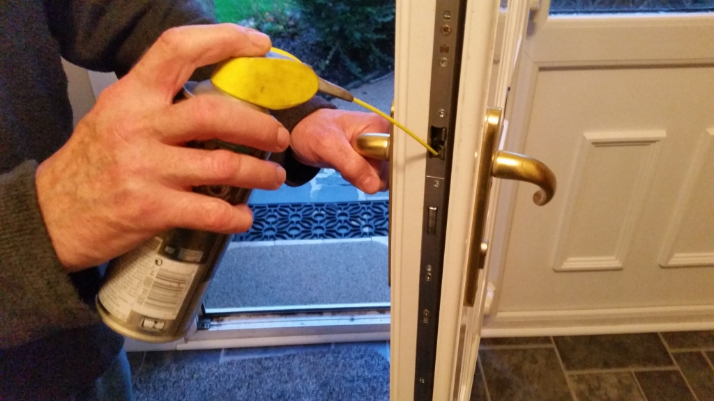 Lock repair Belfast - The Lock Ninja repairing a door lock same day